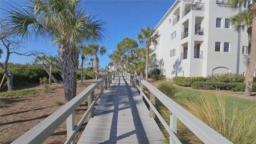 Walkway to intracoastal-pools & clubhouse