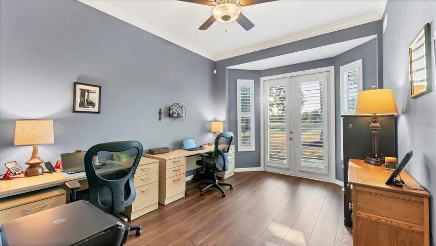 Generous sized main floor office with stunning views of River Club golf course.