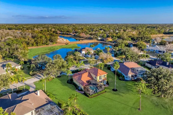 Exceptional home location within River Club community. This home is highlighted by peaceful lake views in the front and expansive golf course views in the rear.