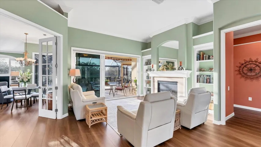 From floor to ceiling, many upgrades throughout...crown molding, upgraded luxury vinyl plank flooring, architectural details and built-ins.