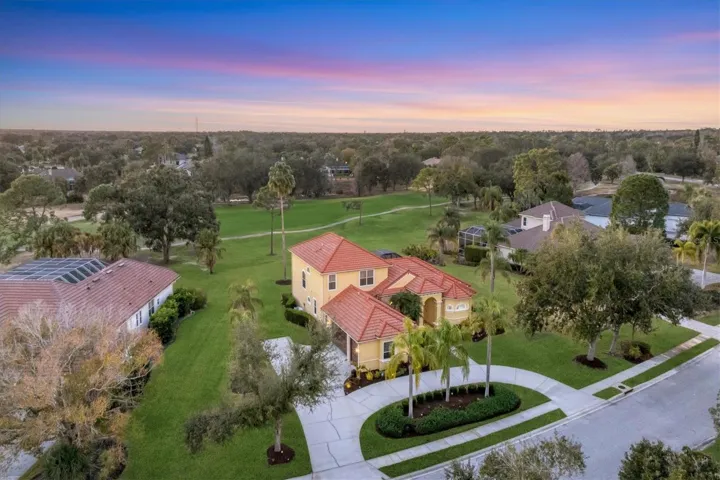 Circular drive with a highly sought after, side loaded 3 stall garage.