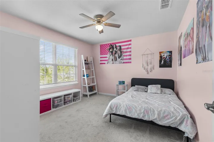 Third bedroom with a view to the pond