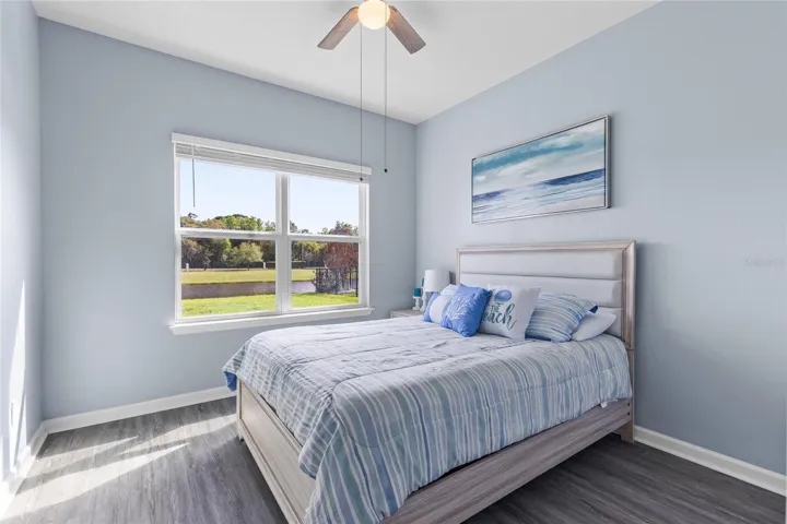 First floor bedroom with views of the pond