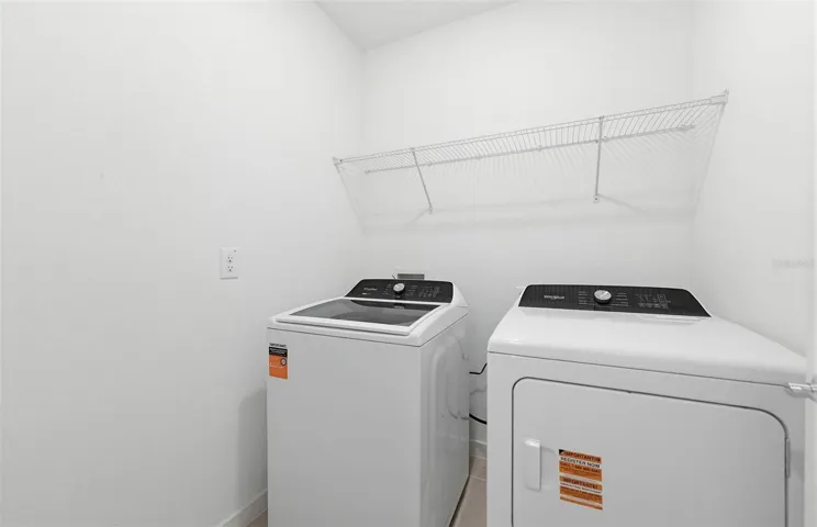 Laundry Room w/Whirlpool Washer and Dryer