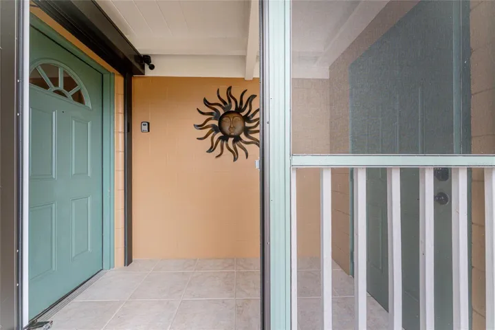 Screened Entry with Access to Oversized 2-Car Garage