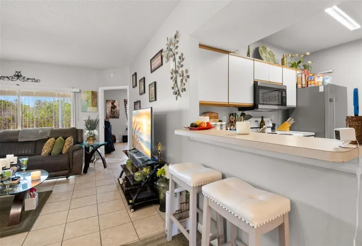 Open-concept design connects the kitchen seamlessly to the living area, creating an easy flow.