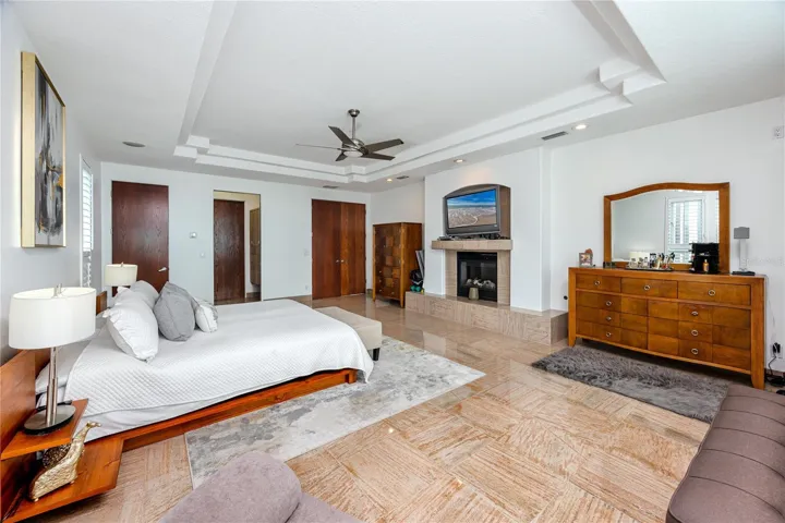 Top floor primary bedroom with fireplace