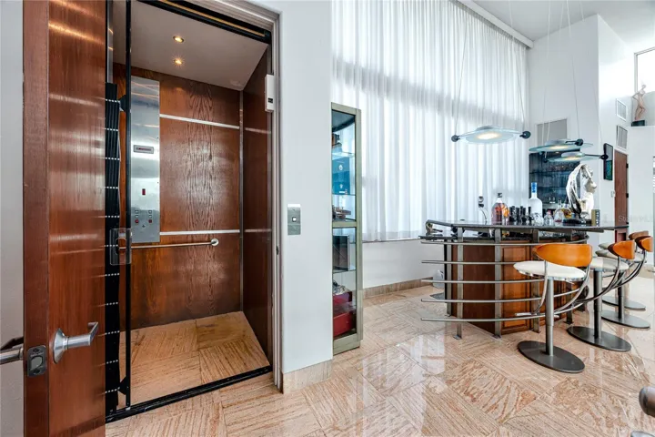 Elevator serving all 3 floors plus rooftop