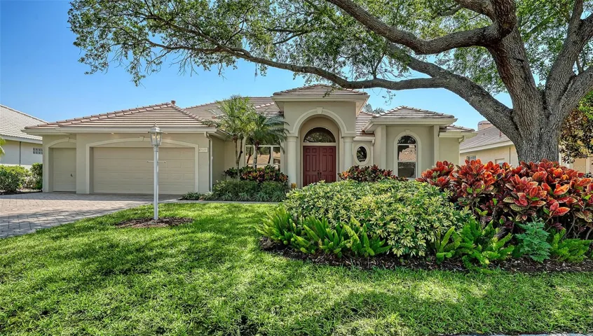 Two car garage plus separate golf cart door.