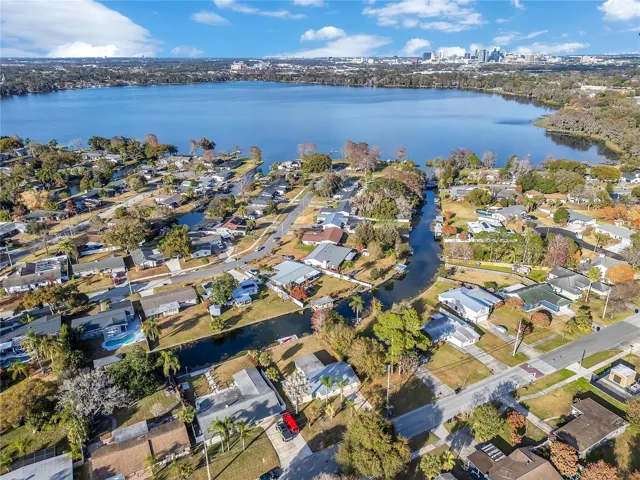 Drone View Showing Canal Exiting to Clear Lake and View of Orlando Skyline
