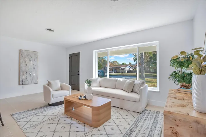 Living Room: tile floor, updated windows