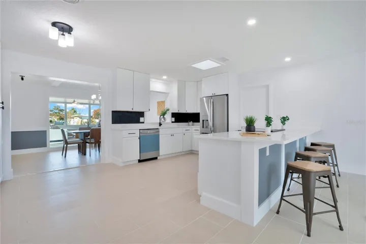 Brand New Kitchen: Stainless Steel Appliances, Snackbar, Slow Close Cabinets, Copper Sink, Quartz Counters, Separate Cabinets for Coffee/Wine Bar