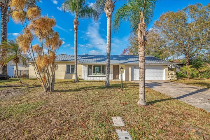 Front: Metal Roof, 2 car garage
