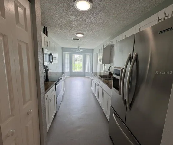 kitchen with pantry and dining space