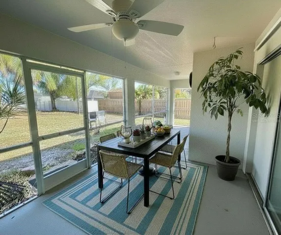 virtually staged back porch (If carpet was removed)