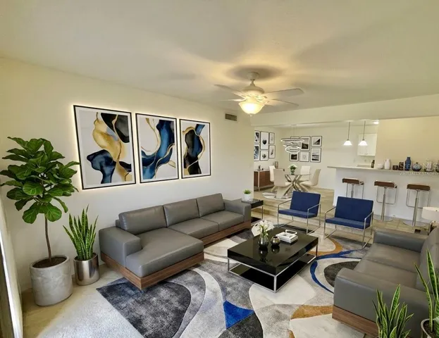 Virtually staged living room with views to lake.