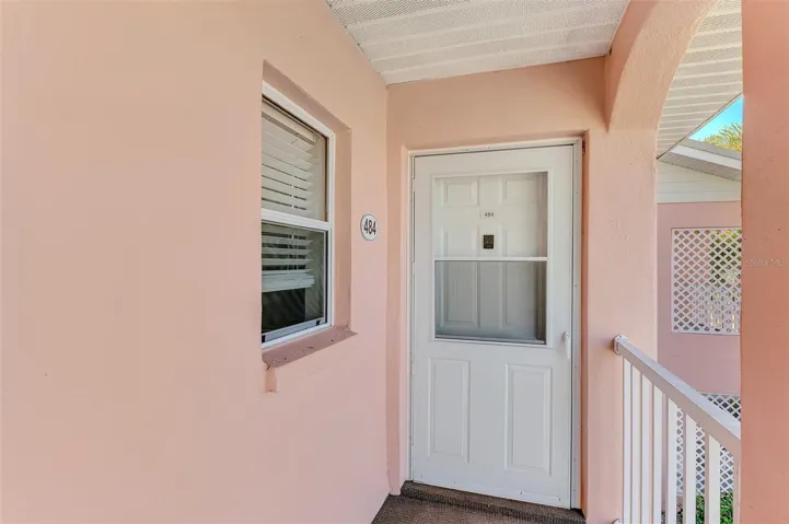 unit 484 entrance with storm/screen door