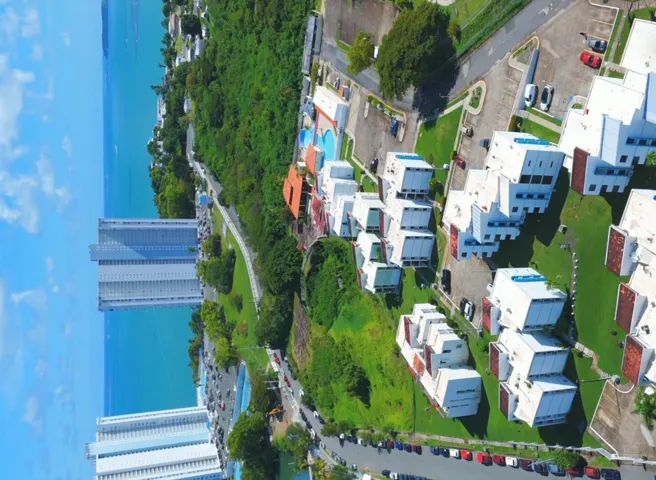 drone view of apartment & area