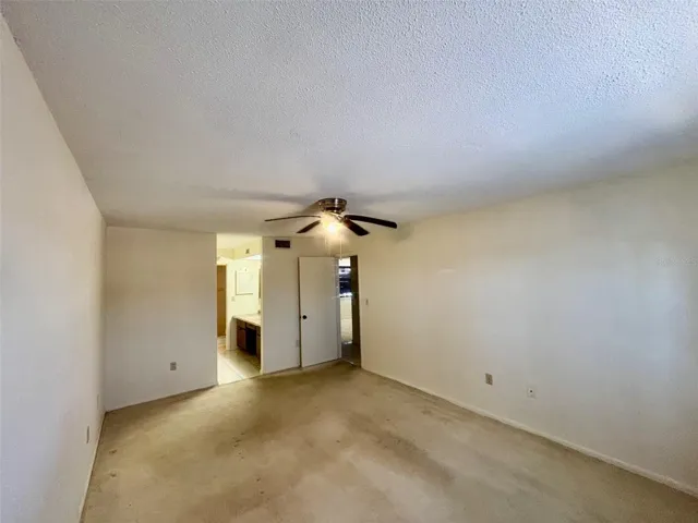 Primary bedroom looking toward private bathroom