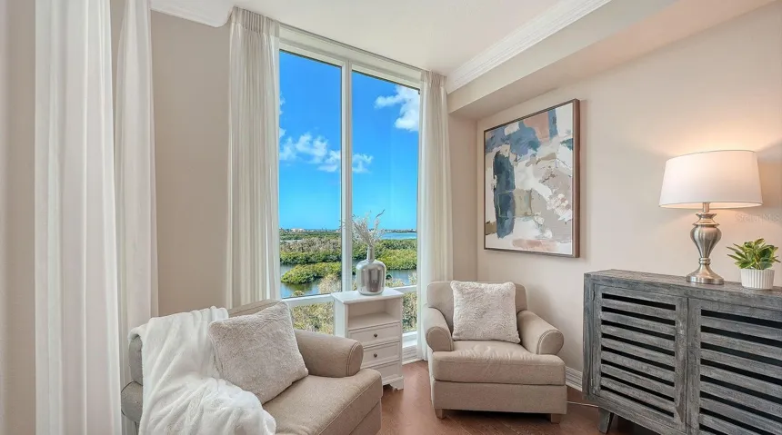 Primary suite with water views & lanai access