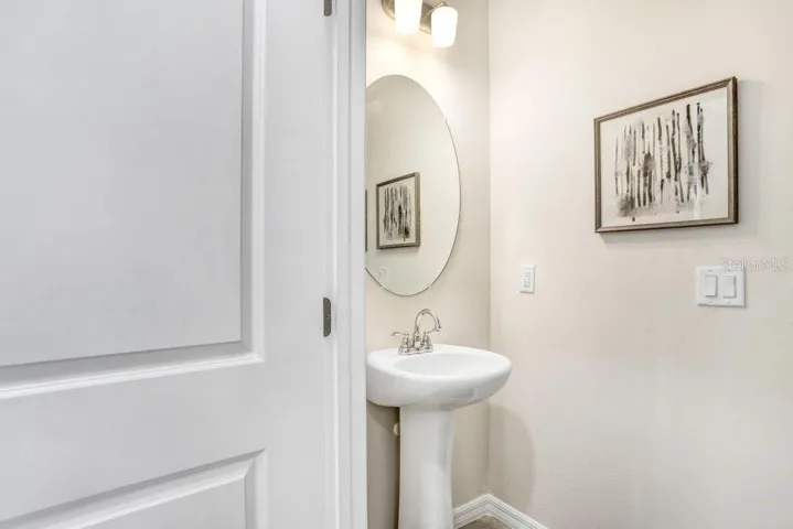 Downstairs Half Bath (photo of model home)