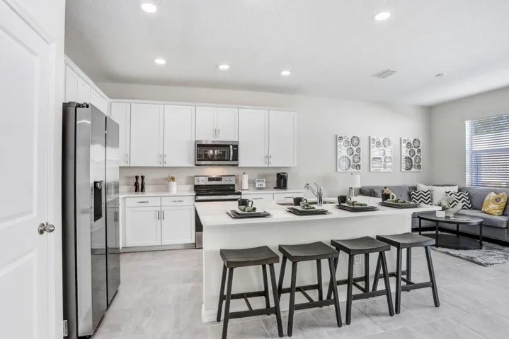 Big Island with Quartz Countertops (photo of model home)