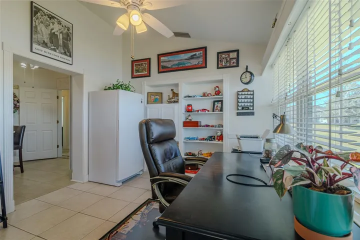 Office off the kitchen with Built-In Shelves