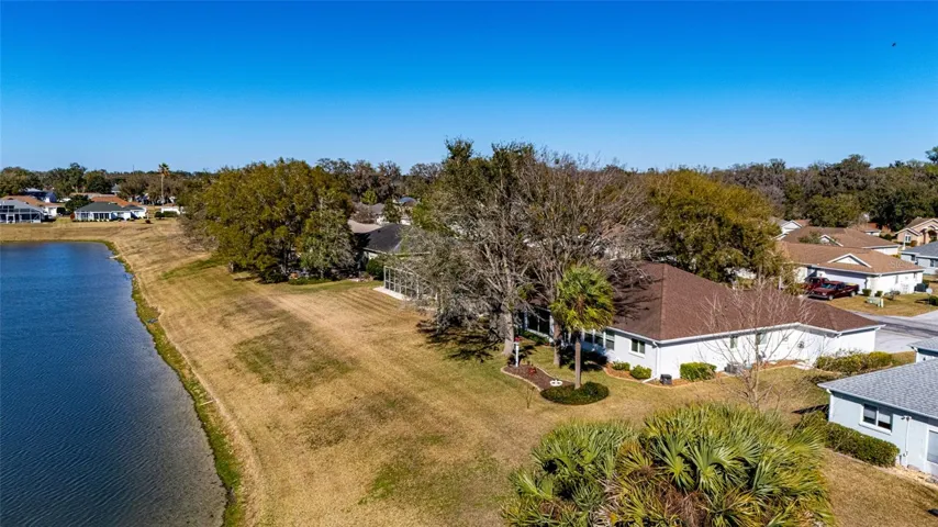 Drone View of Lake and Back of the House