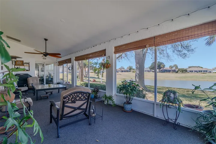 Screened Florida Room with great view of the lake and golf course