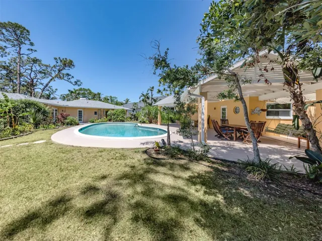 Back view, pool and large back yard