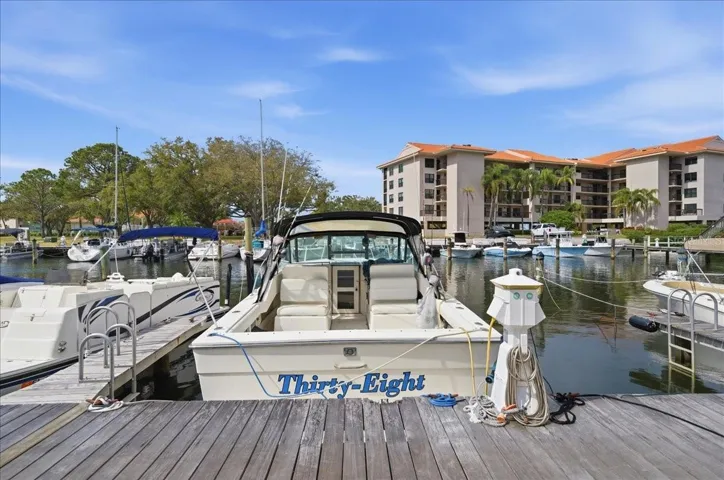 Tarpon Cove’s resort-style amenities include: two pools and spa, tennis courts, exercise facility, putting green, fishing pier, Kayak storage & launch, recreational clubhouse, waterfront nature walking trail, grill and picnic areas, and a private deep water channel with  direct gulf access - no bridges!