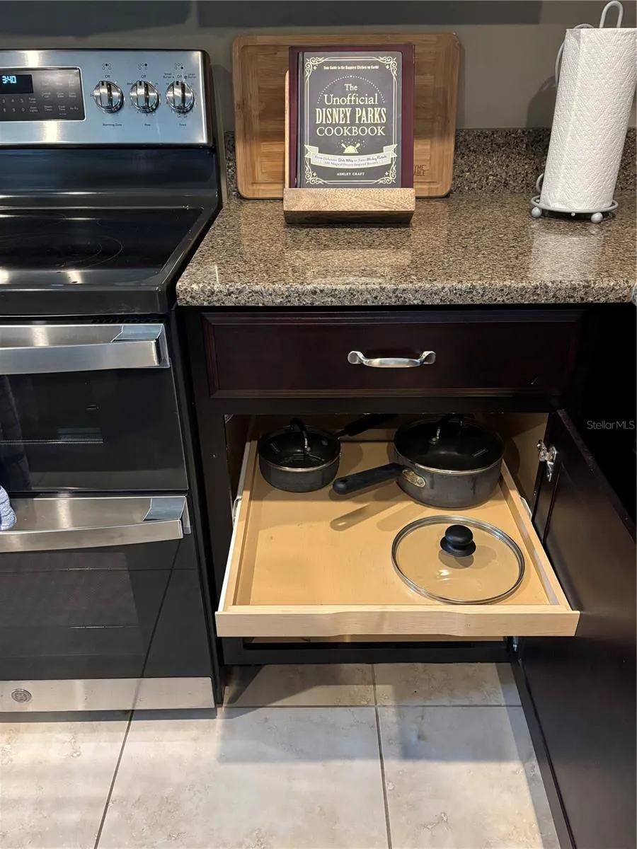 Kitchen has high end cabinets that come with pull out drawers