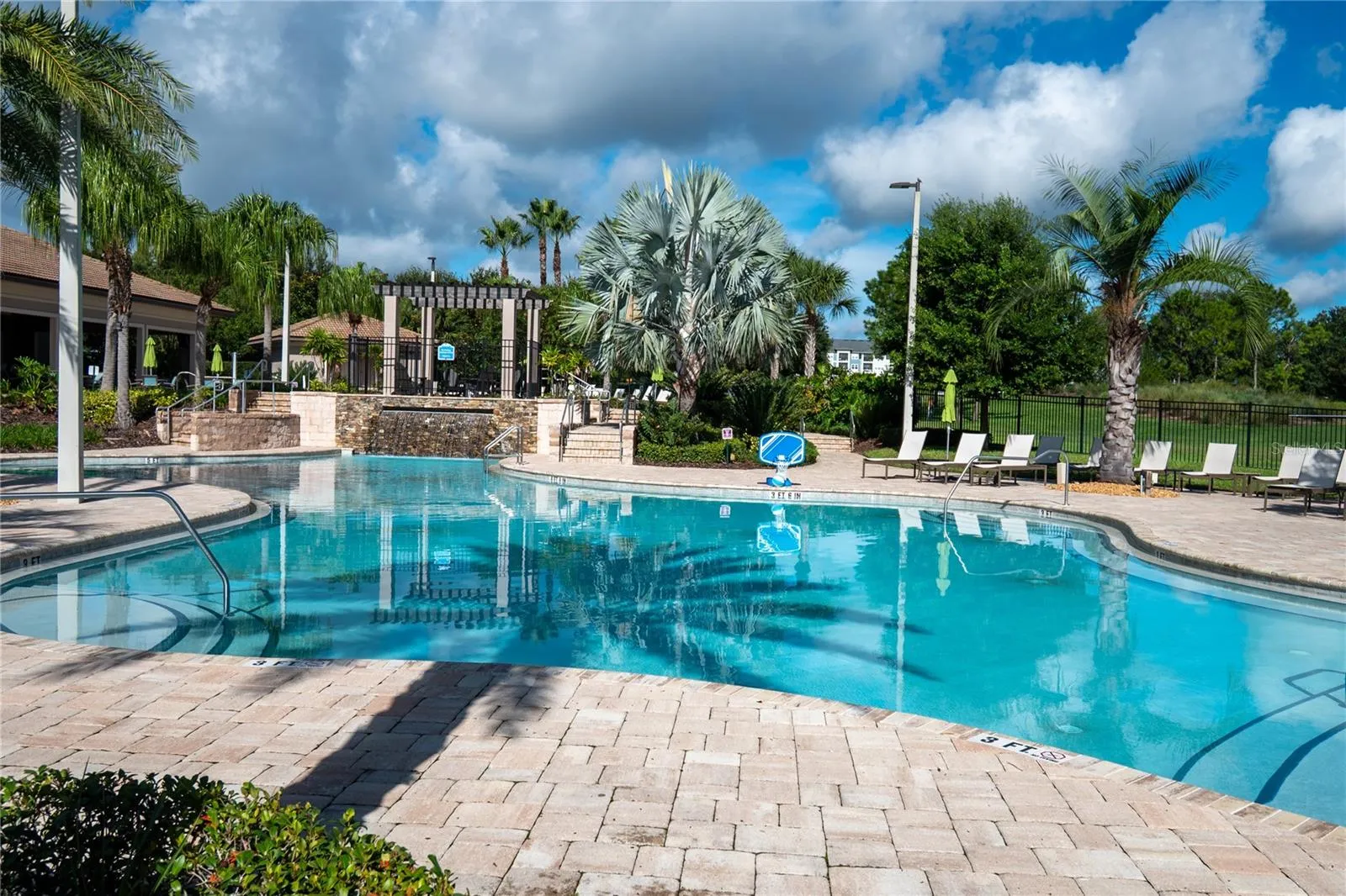 The Plaza - lower pool, waterfall, and loungers