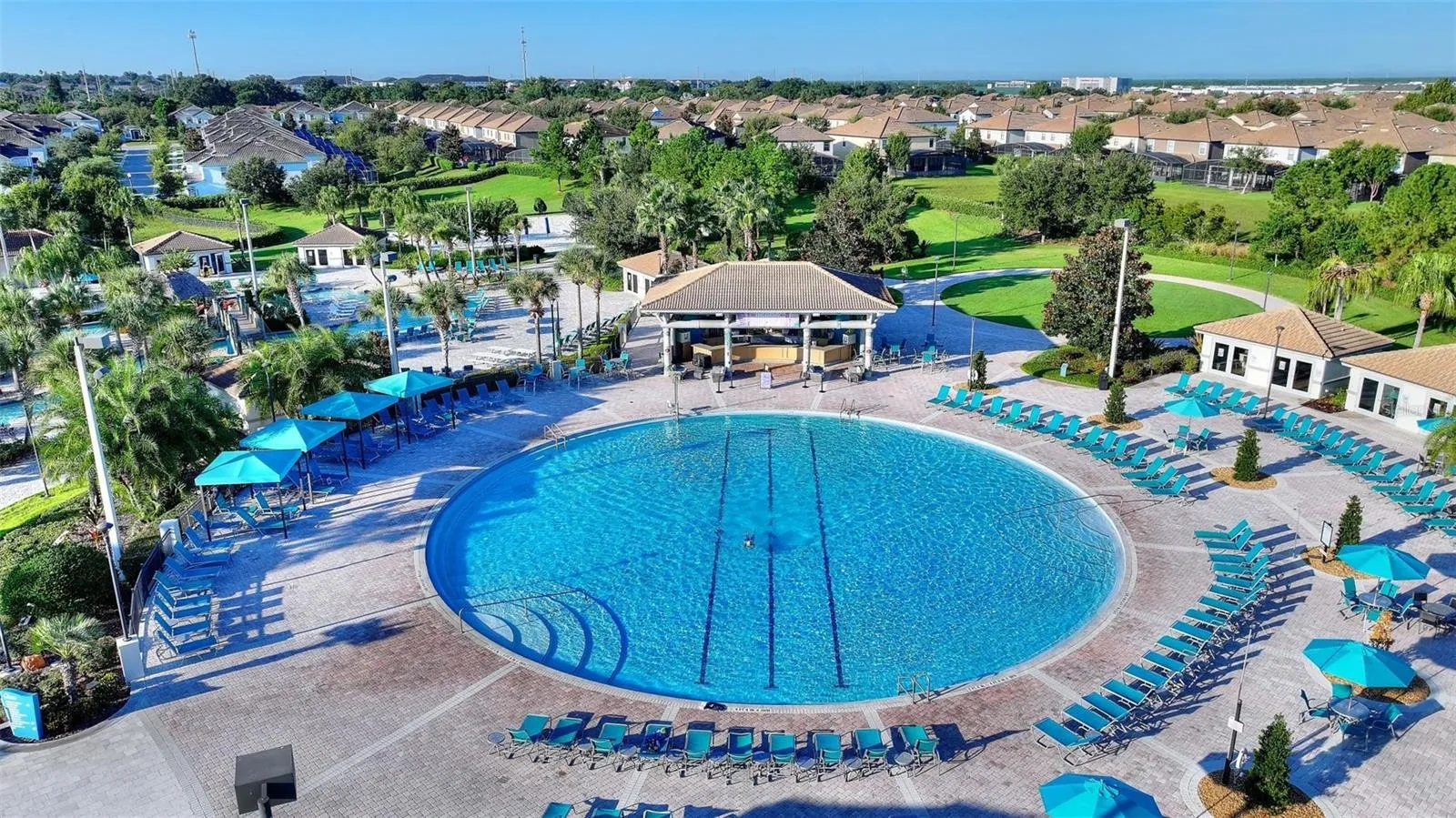 Oasis Club adult pool, loungers, Cabanas, and Tiki Bar