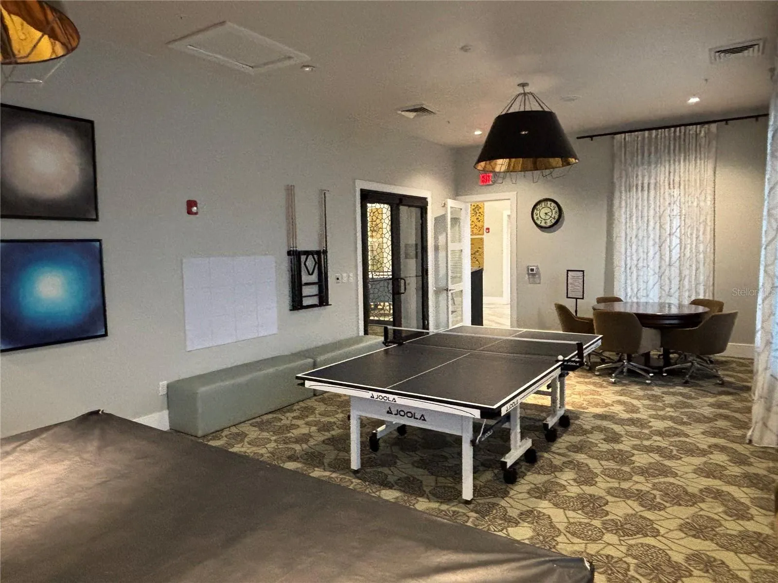 The Plaza - resident only game room with pool table, ping pong, card table, tv, etc.