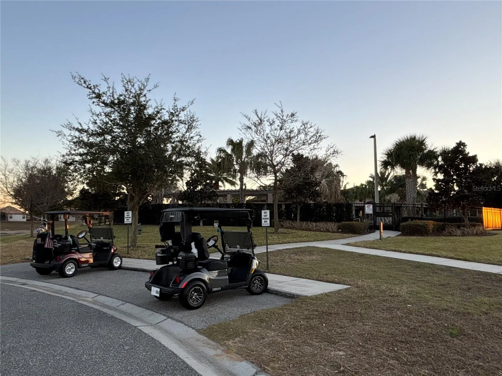 Golf cart only parking at the back entrance of The Plaza