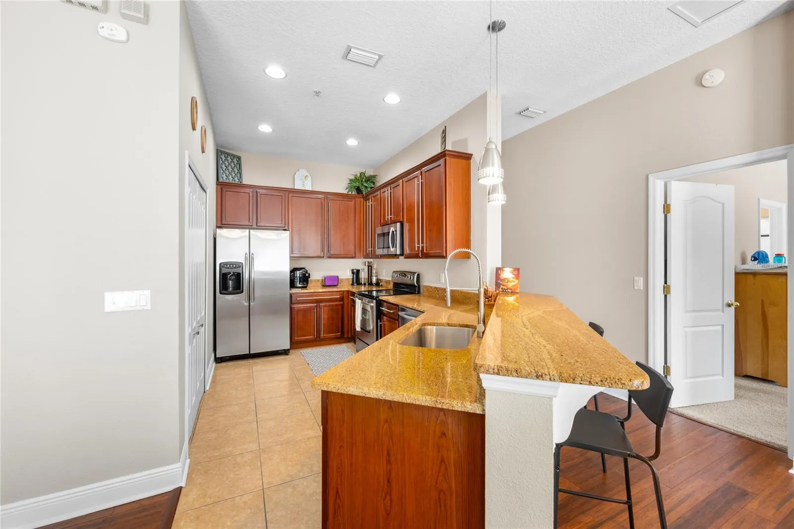 Kitchen with granite counters and stainless steel appliances