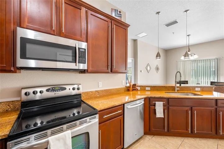 Kitchen has upgraded cabinets and hardware