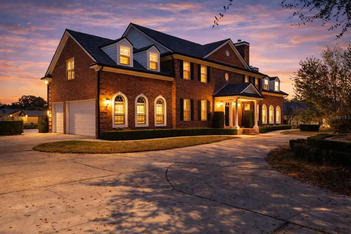 Welcome home to your one-of-a-kind Neo Classical Colonial solid brick estate.