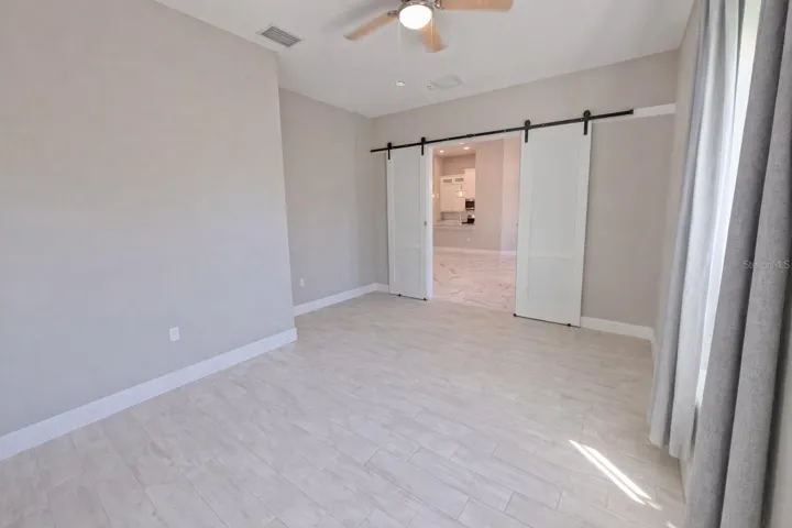Den with Barn door