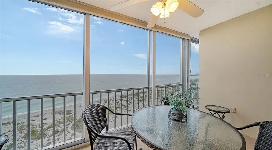 The screened and covered balcony allows all weather usage....