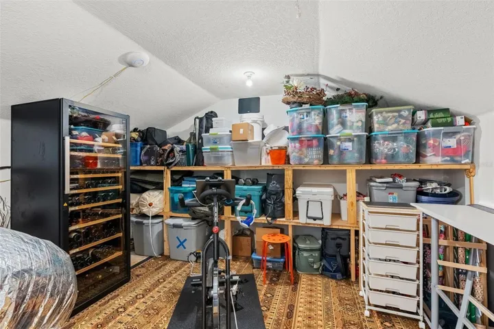 Extra storage in finished attic space under AC