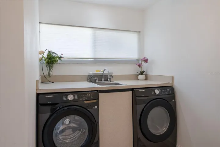 Large Laundry Room with HE Washer & Dryer