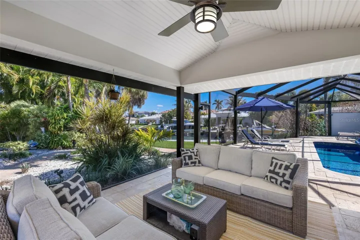 Screened Room Adjoins Pool Deck creates added year round comfort