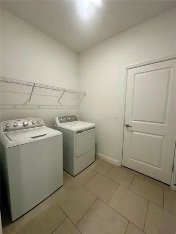 Laundry room with washer and dryer