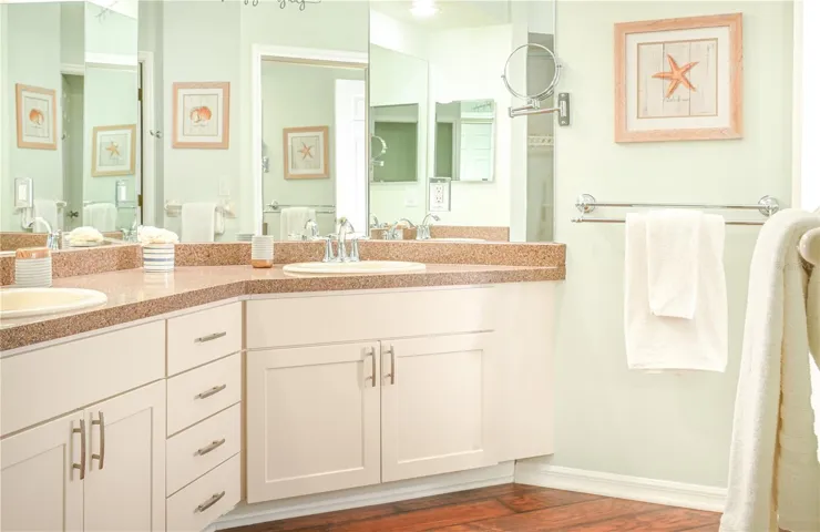 updated bathrooms include double sinks in the primary suite