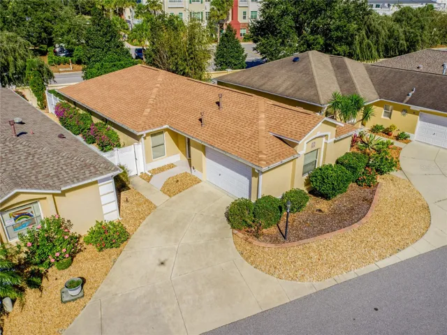 Major updates just completed in 2025 make this low-maintenance villa in the sought-after Village of Tall Trees truly move-in ready!