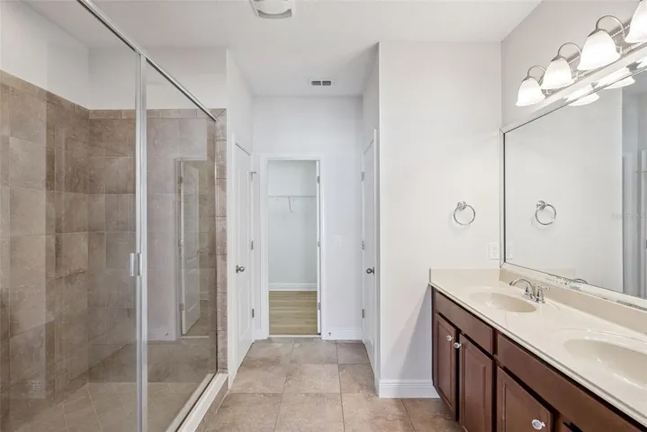 Primary Bath with double vanities, large walk in shower