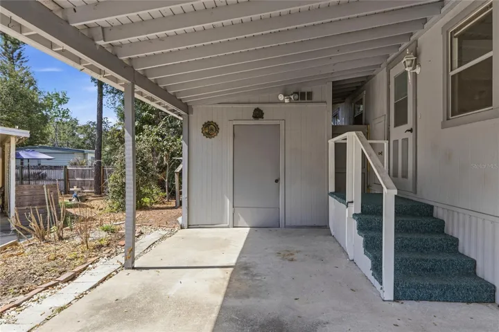 Carport and storage closets/shed