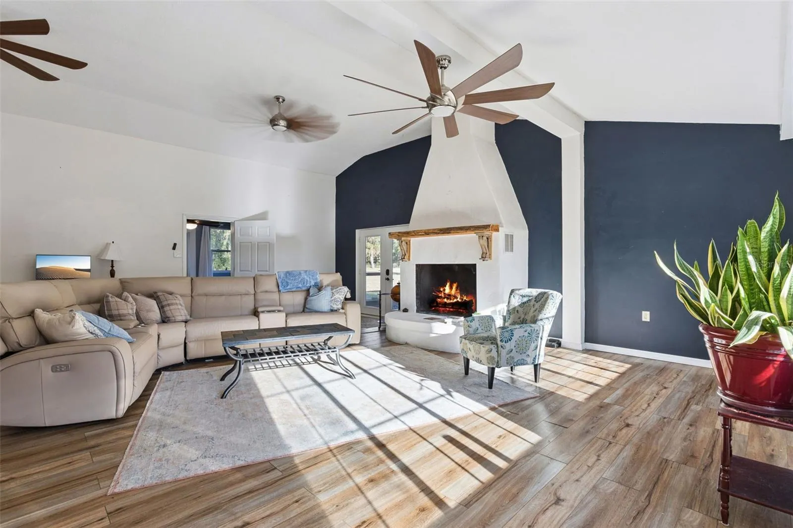Newly remodeled fireplace is a great focal point to this living room